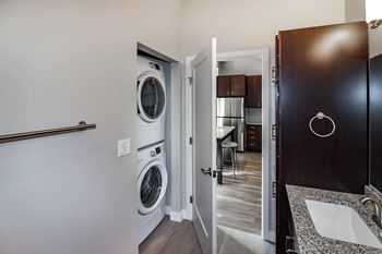 A laundry room with a washer and dryer